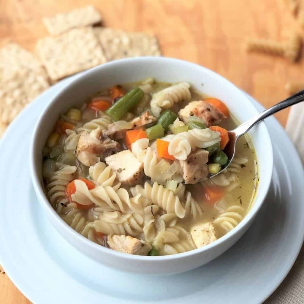 A bowl of allergy free chicken noodle soup