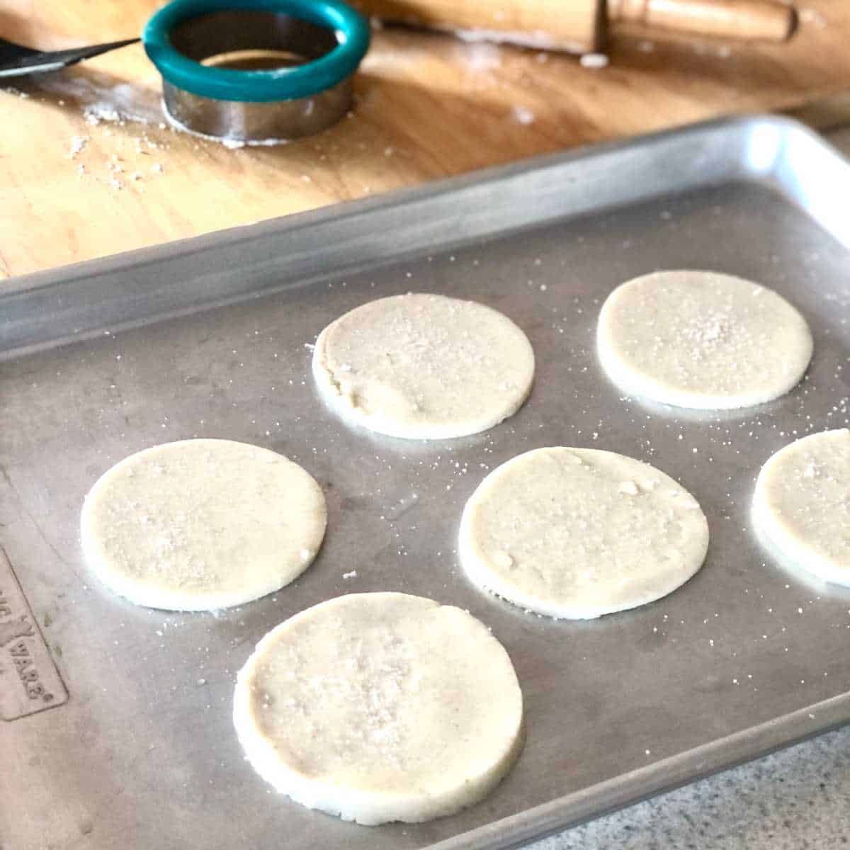 Gluten free dairy free pie crust rounds on a cookie sheet