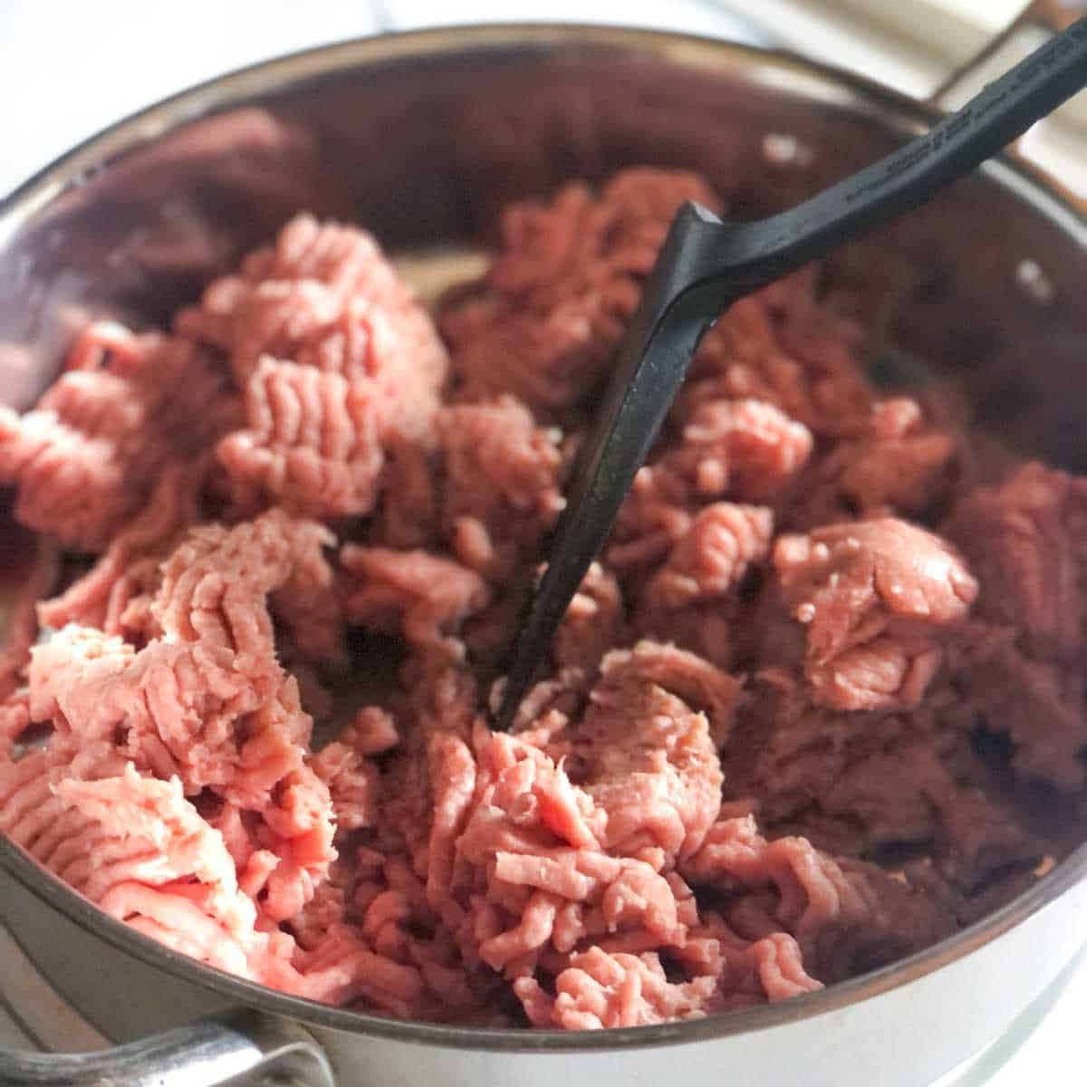 ground turkey being browned in a skillet.