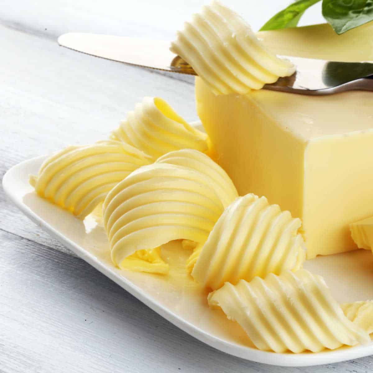 A block of dairy free butter and a knife