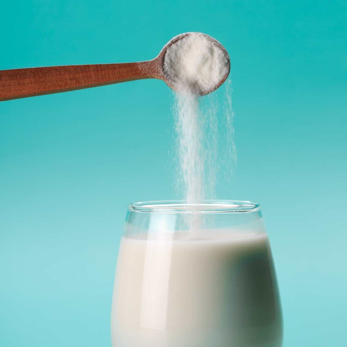 A bottle of milk made with dairy free milk powder